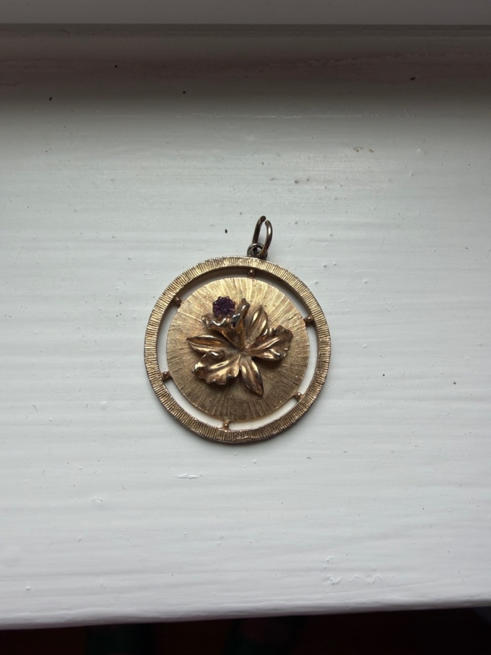 Heavy vintage gold tone pendant